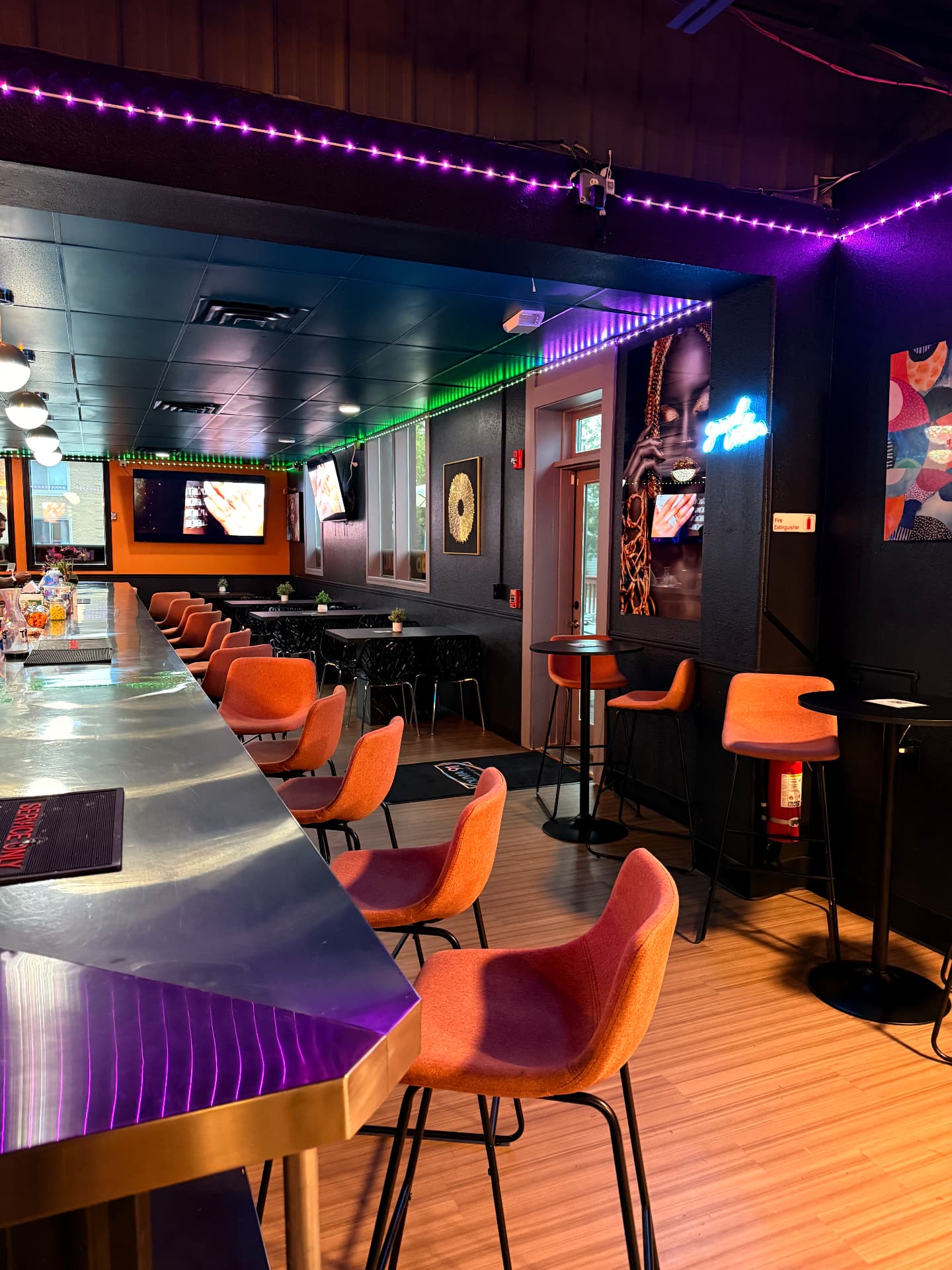 Bar seating and lounge tables at Olivia 91